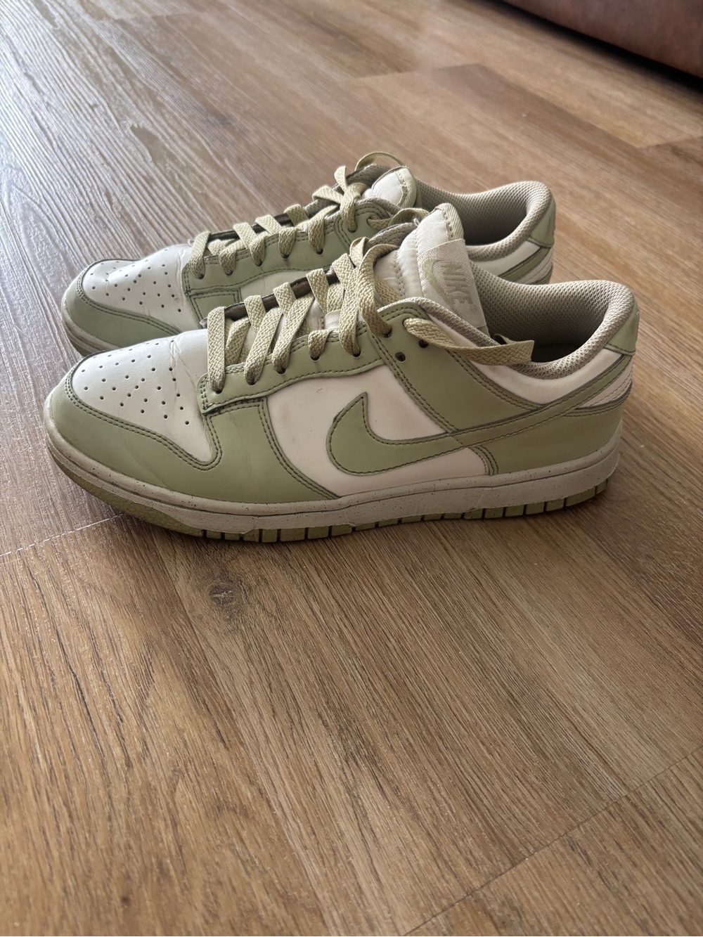 Green and white Nike Dunks